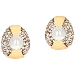 Pendientes Cartier de perlas y diamantes en forma oval, oro amarillo de 18 quilates