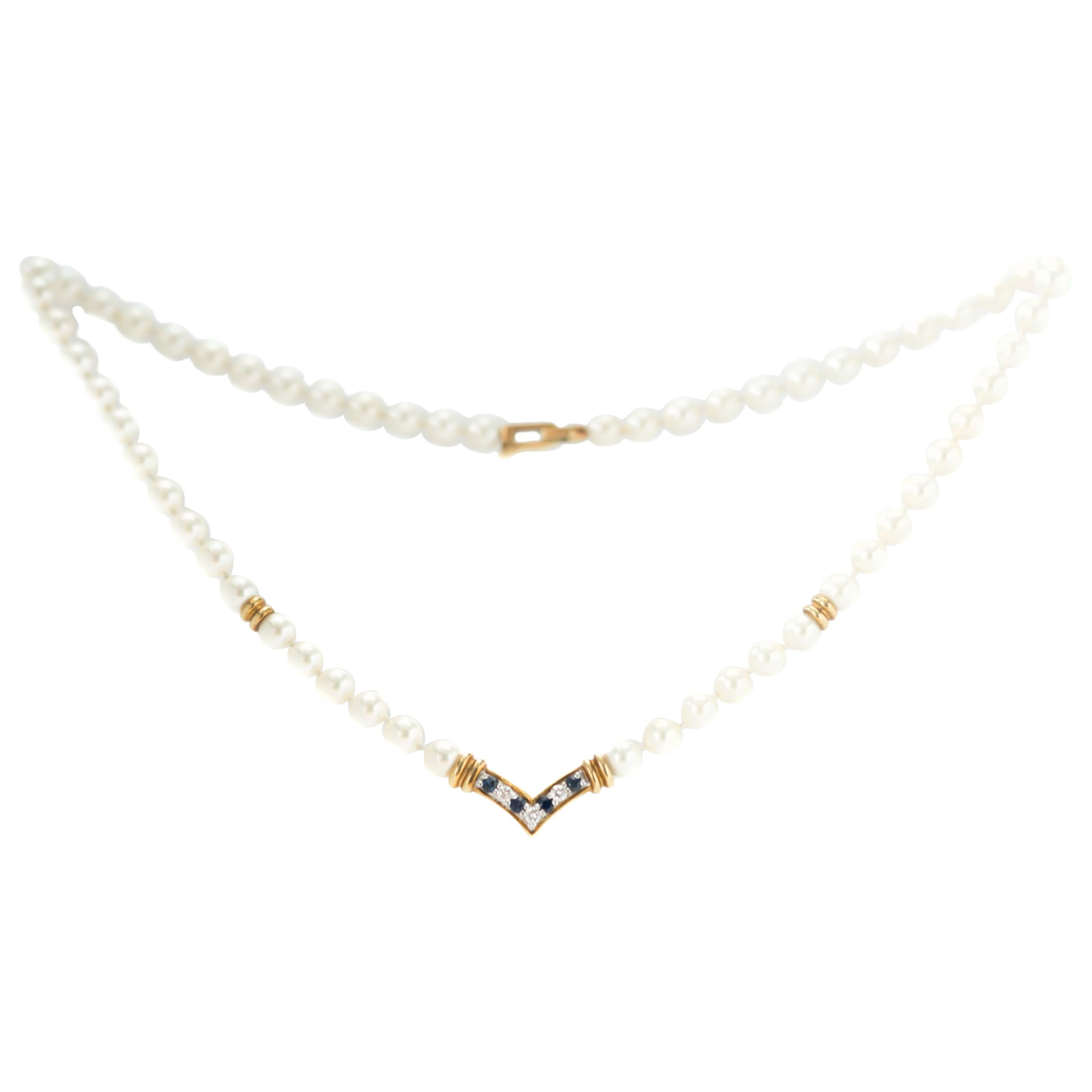 Cartier Pearl Necklace with Sapphires, Diamonds and 18 Karat Yellow Gold
