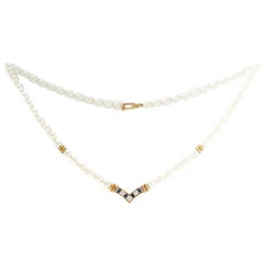 Cartier Pearl Necklace with Sapphires, Diamonds and 18 Karat Yellow Gold