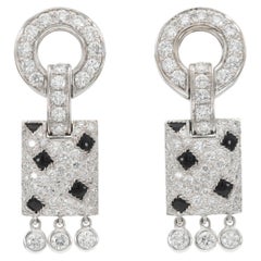 Orecchini Cartier Pelage Panthère con diamanti e onice