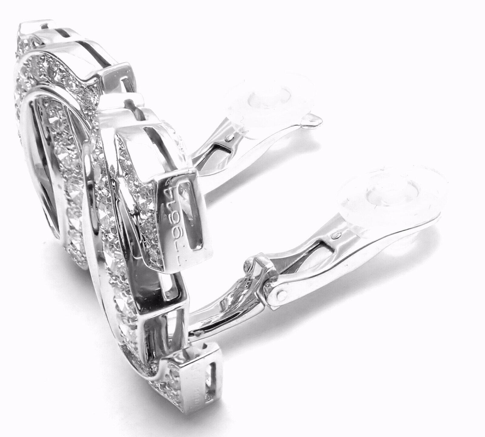 18k White Gold Diamond Large Penelope Double C earrings by Cartier. 
With 68 Round brilliant cut diamonds total weight approx 2.40ct. 
Diamonds VVS1 clarity, E color
****Earrings are made for non pierced ears
but they can be converted for pierced