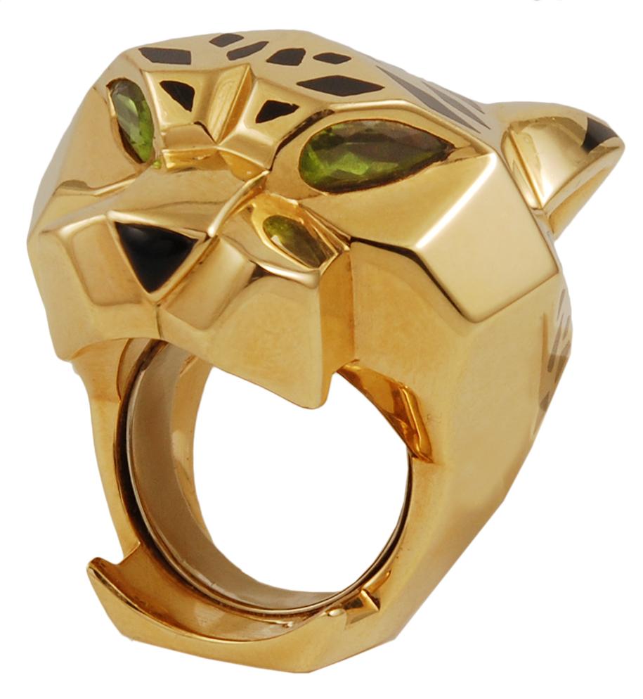 The iconic Panthère de Cartier collection represents beauty, strength, and timeless elegance. This extraordinary vintage piece embodies Cartier’s most iconic creature, the great Panther, crafted as an 18k yellow gold ring, with peridot eyes of