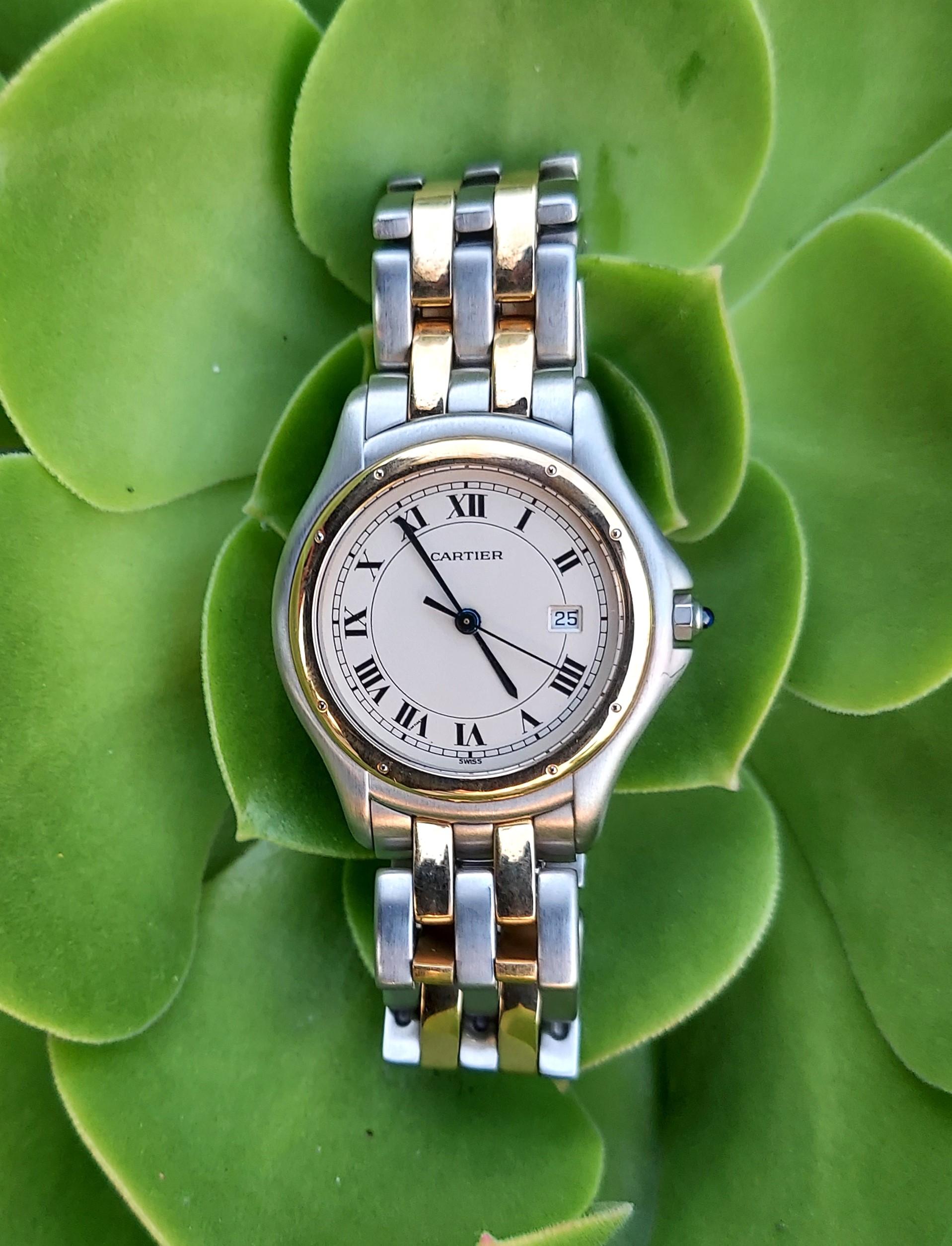 This Cartier Cougar watch is a testament to timeless elegance and precision with its quartz movement and classic design. The watch is in very good condition, indicating minimal signs of wear. It's a versatile piece suited for both men and women,