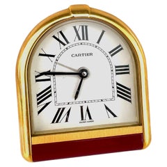 Cartier, Small gilt brass table alarm clock, quartz, circa 1990