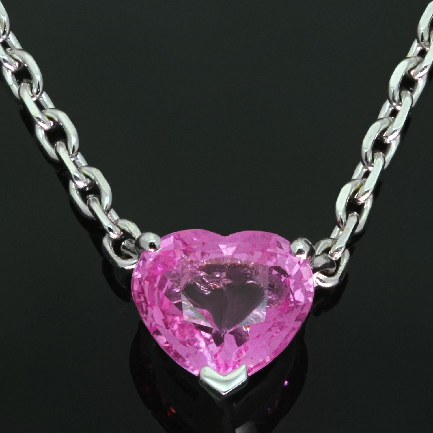 This lovely Cartier 18k white gold necklace features a heart-shaped pink sapphire pendant completed with a link chain. Made in France circa 2010s. 