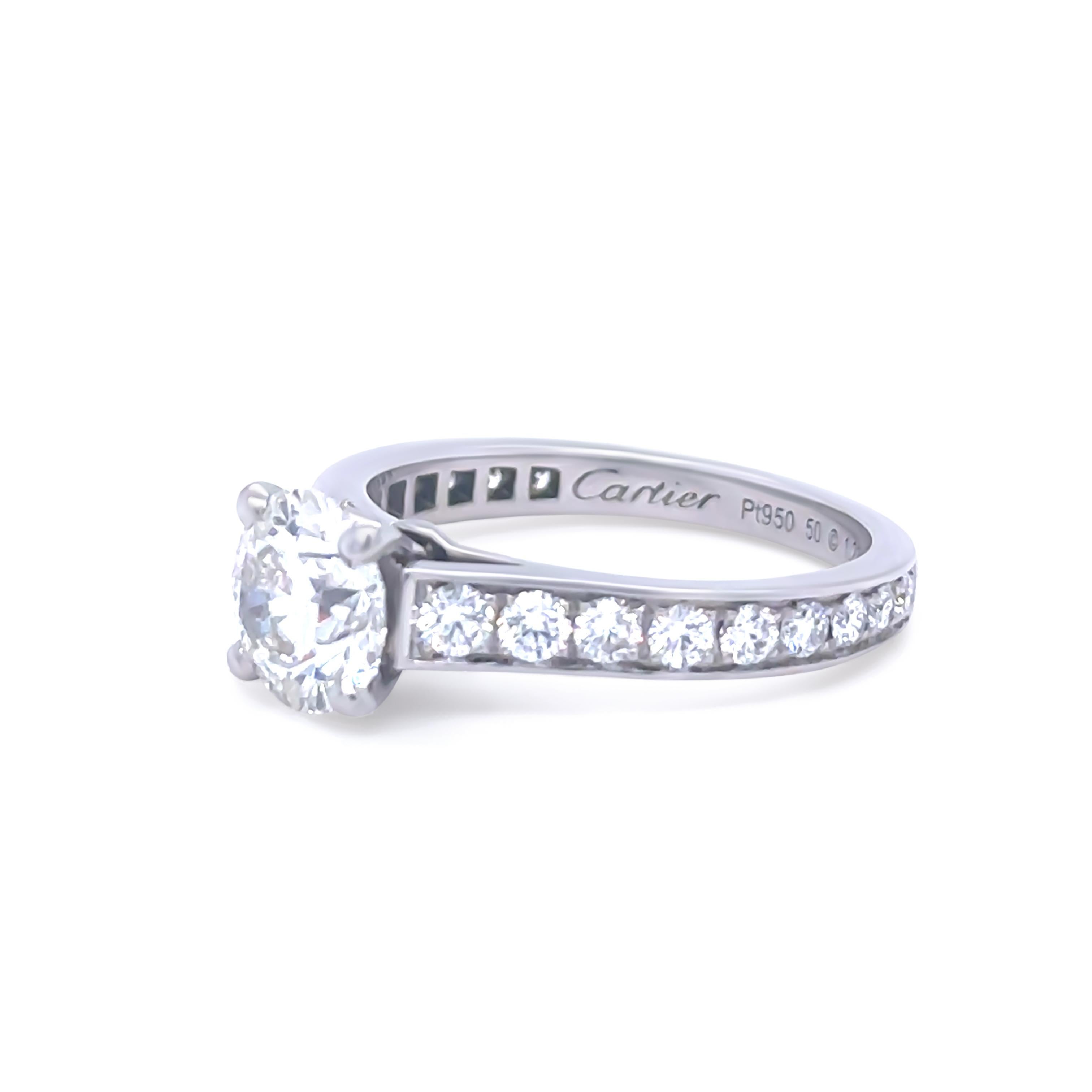 This luxurious Cartier 1895 Solitaire engagement ring is crafted in platinum and features a stunning GIA-certified 1.23ct round brilliant cut diamond, graded H colour and VVS2 clarity. The diamond is four-claw set in Cartier’s timeless 1895 setting,