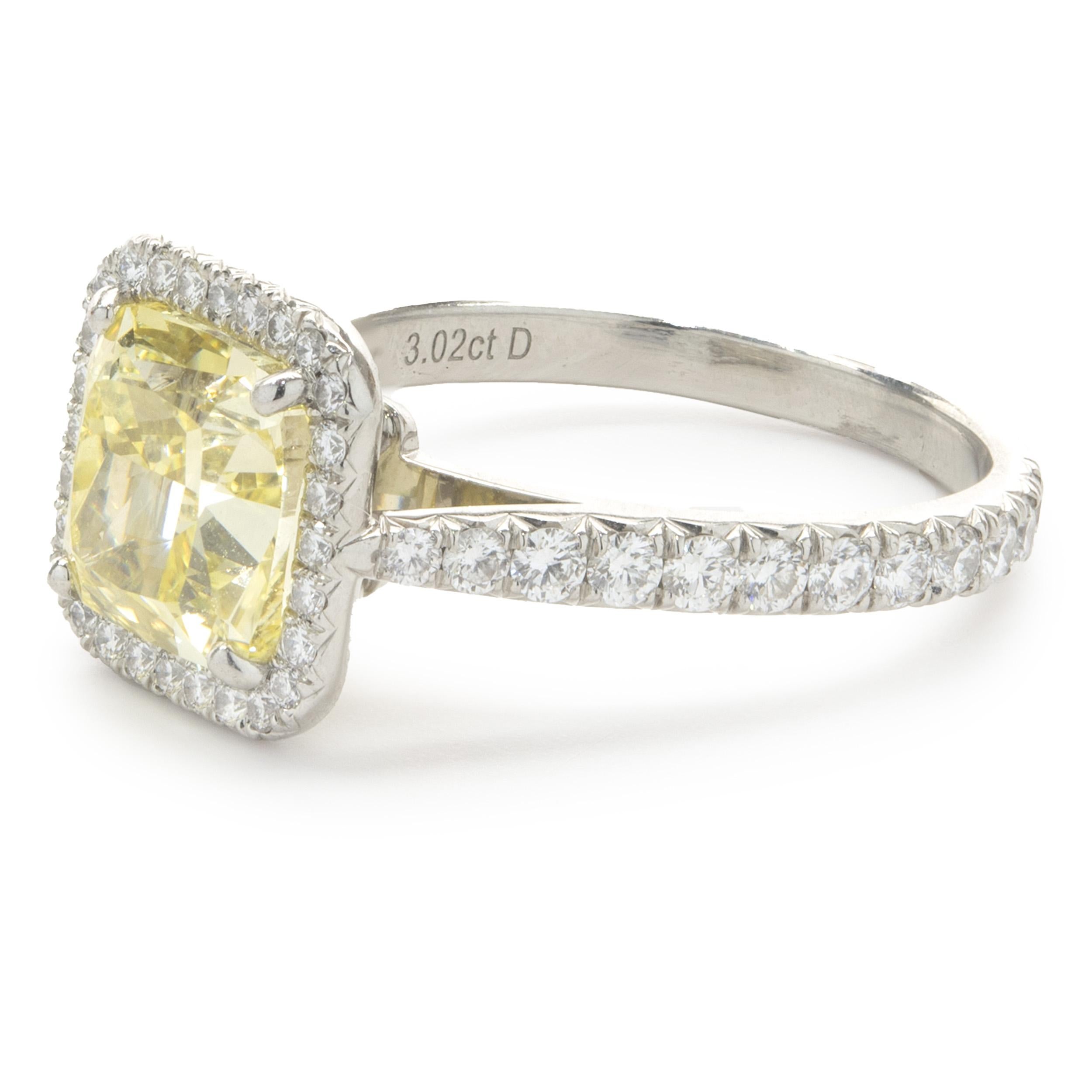 Designer: Cartier
Material: Platinum
Diamond: 1 cushion cut = 3.02ct
Color: Intense Fancy Yellow
Clarity: VS1
GIA: 2175140072
Diamond: round brilliant cut = 0.97cttw
Color: F
Clarity: VS1
Serial # 79PXXX
Size: 6.5 (complimentary sizing