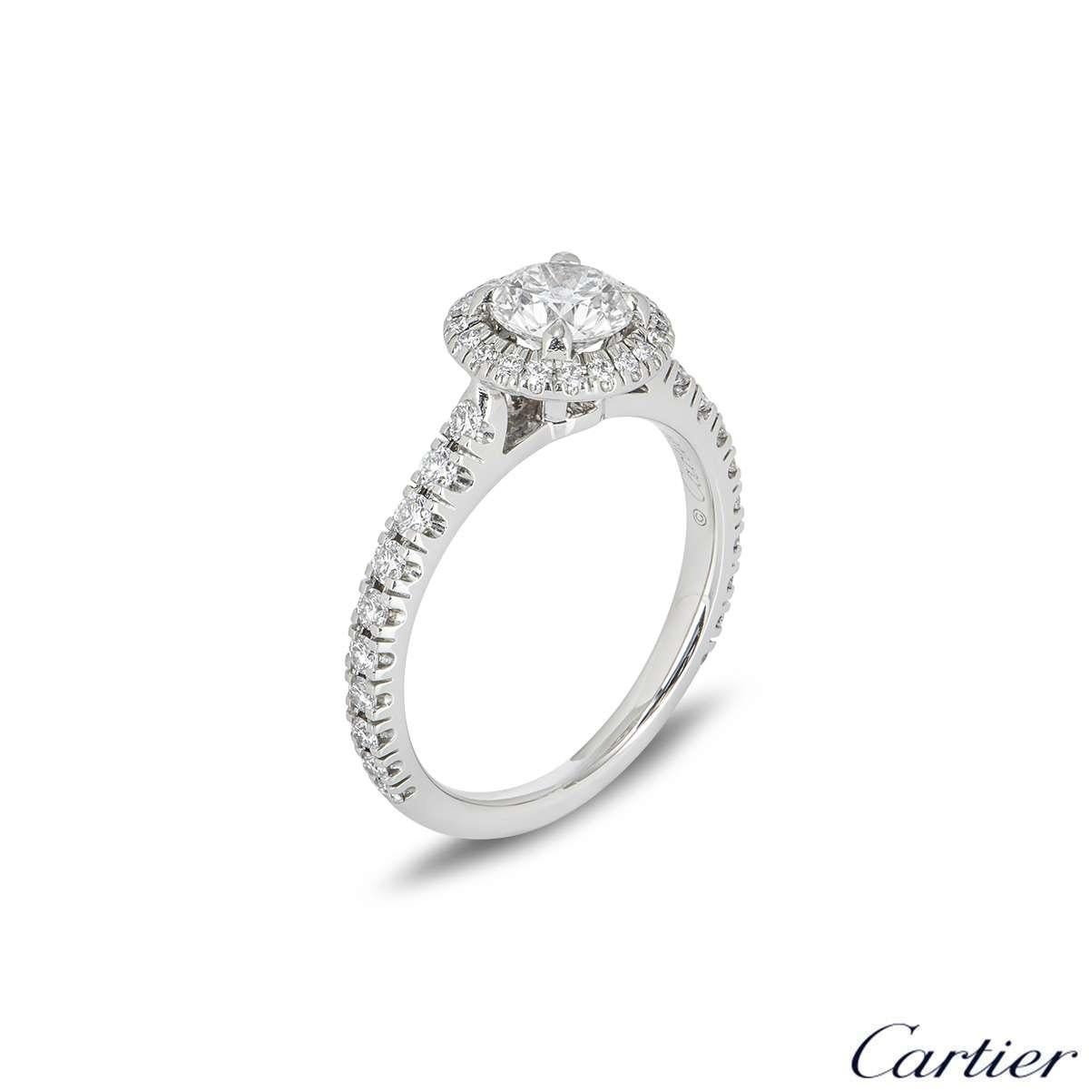 An elegant diamond ring in platinum from the Destinée Solitaire collection by Cartier. The ring is set to the centre with a round brilliant cut diamond weighing 0.70ct, D colour and VVS1 clarity. The diamond scores an excellent rating in all three