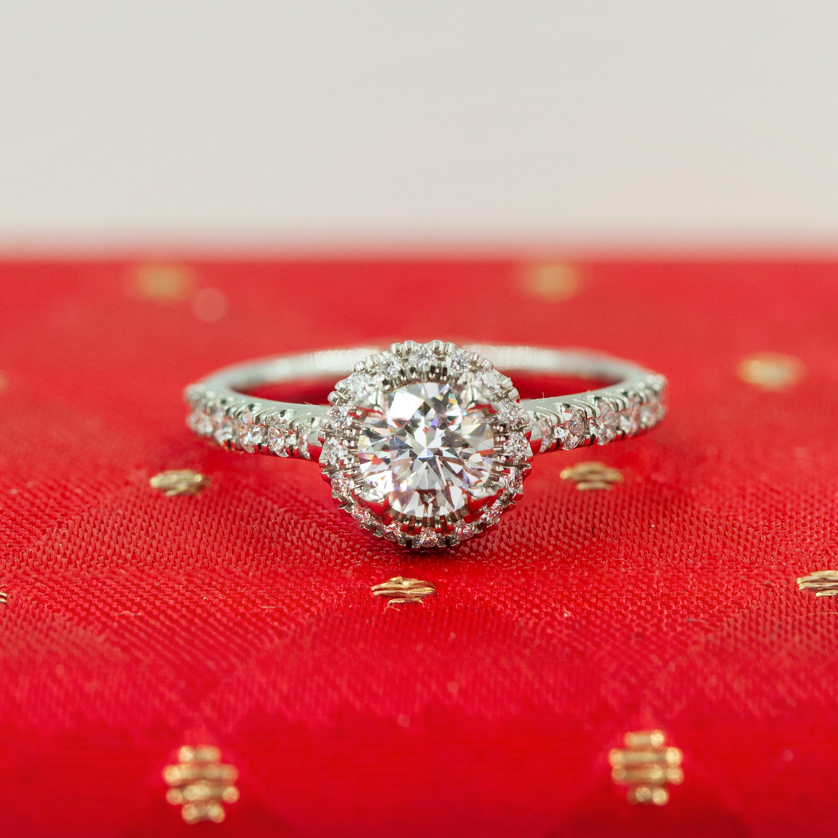 Cartier Destinée solitaire engagement diamond ring crafted in platinum center stone is GIA certified in H color / VVS1 clarity
GIA certificate # 7212499393

The Destinée setting is characterized by
30 similar color and clarity smaller diamonds set