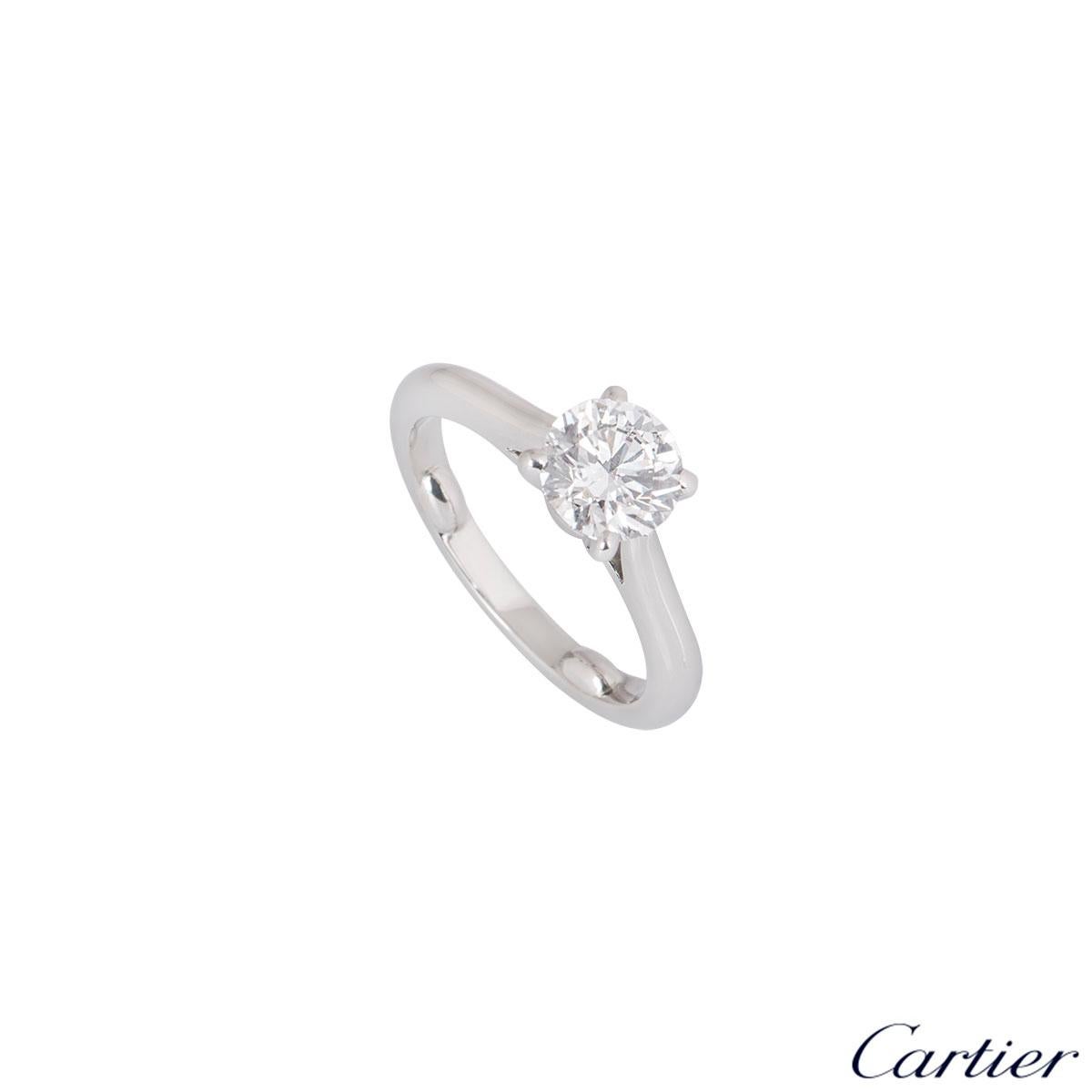 A stunning platinum diamond engagement ring by Cartier from the 1895 solitaire collection. The ring comprises of a round brilliant cut diamond in a four claw setting with a weight of 1.16ct, G colour and VVS1 clarity. The diamond scores an excellent