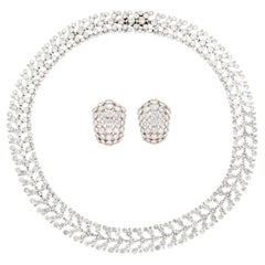 Collana e orecchini in platino e diamanti CARTIER