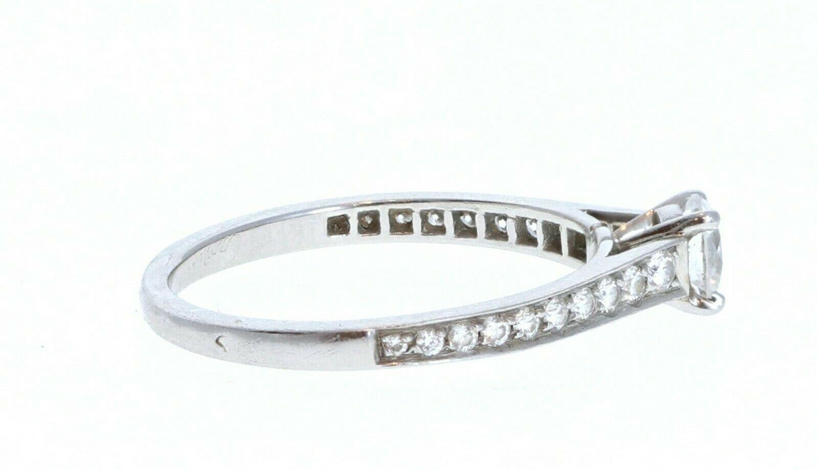 Cartier Platinum & Diamond Ring 0.52ctw Size 5.25 

For sale is a Cartier platinum and diamond ring. 
The center stone is a  0.32 ct round brilliant cut diamond H, VS1
The mounting is comprised of approx. 0.20 ctw
 Perfect worn day or night.
 Get