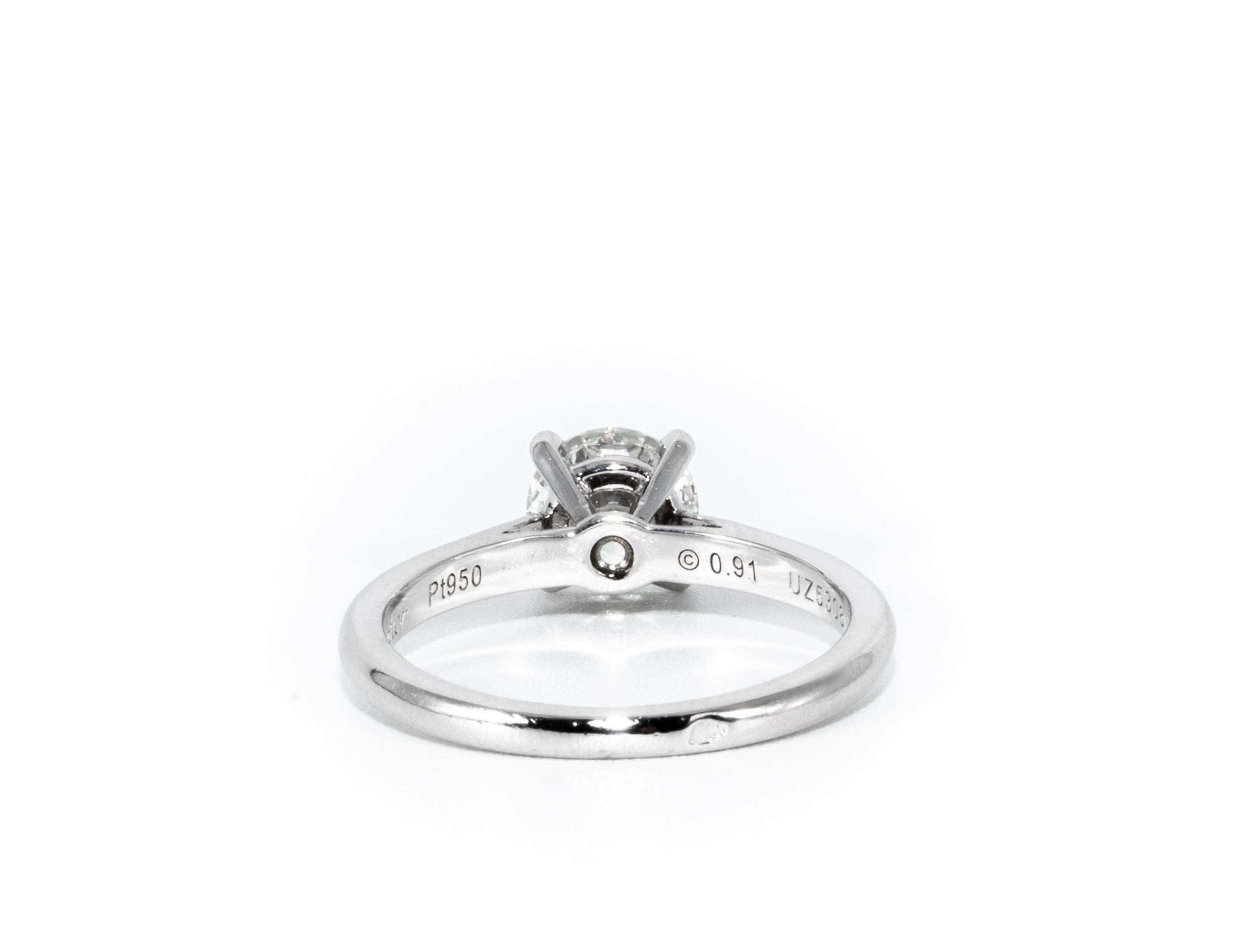 Contemporary Cartier Platinum Engagement Ring with .91 Carat Round Brilliant Centre