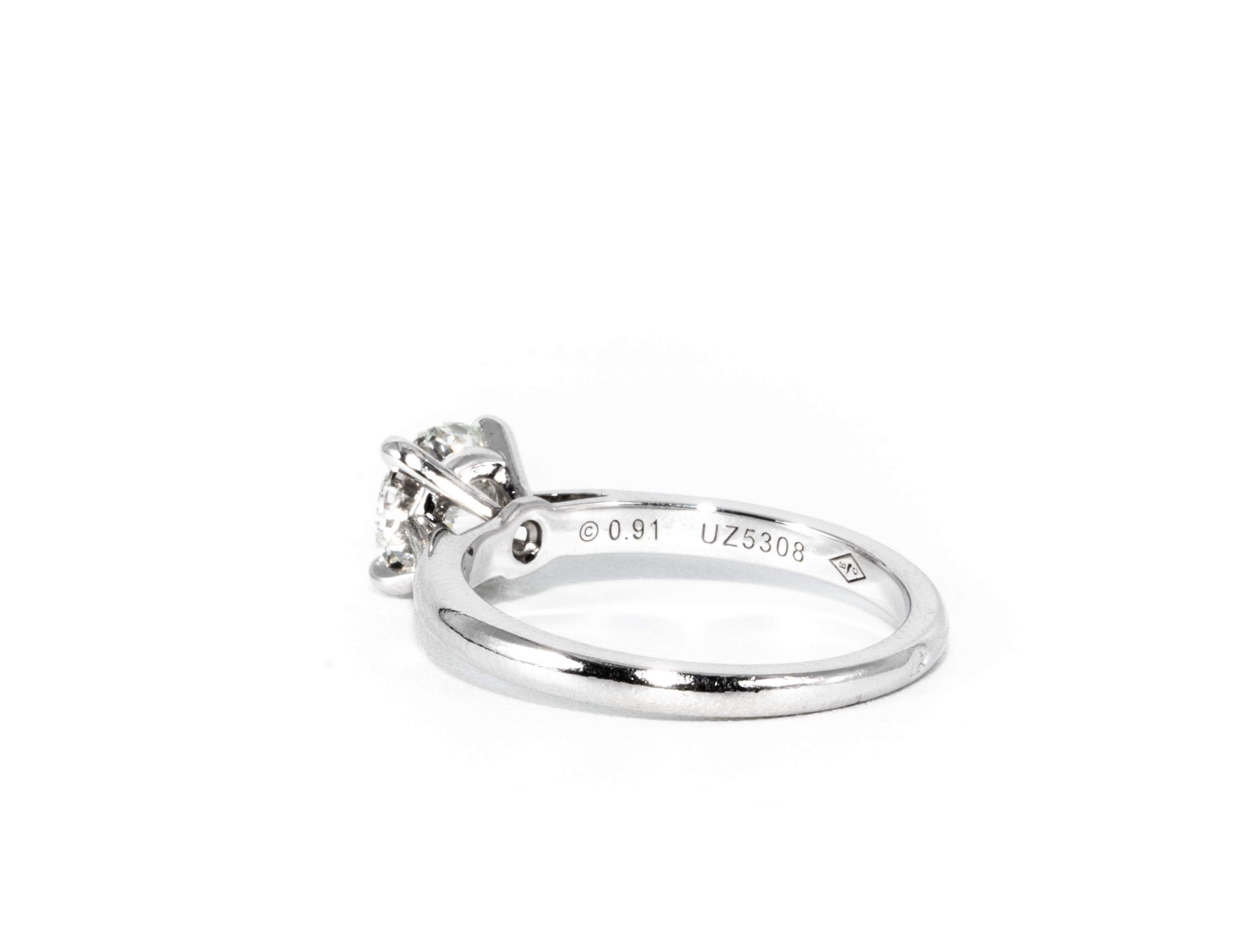 Round Cut Cartier Platinum Engagement Ring with .91 Carat Round Brilliant Centre