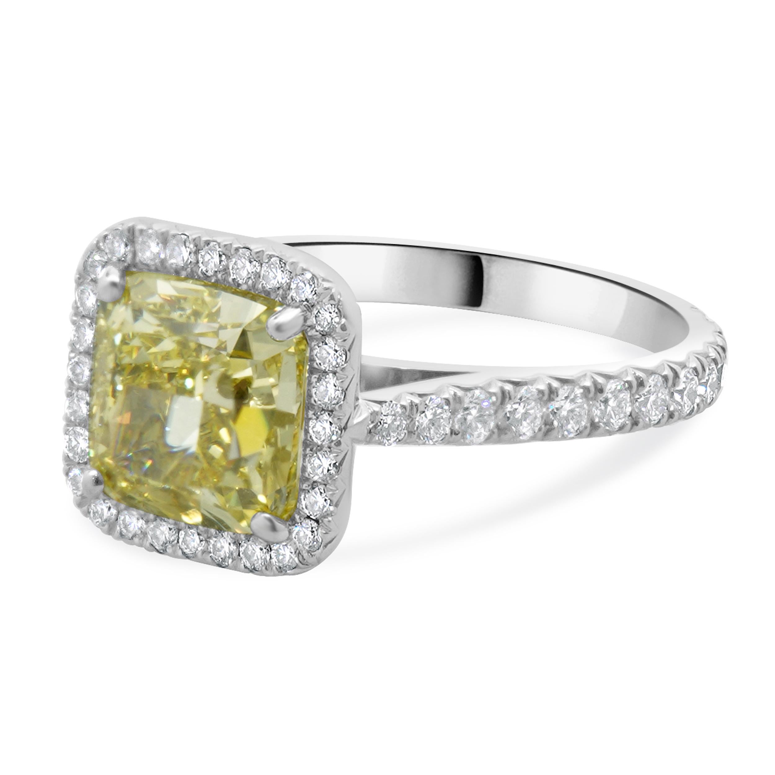Designer: Cartier
Material: platinum
Diamond: 1 cushion cut = 3.02ct
Color: Fancy Intense Yellow
Clarity: VS1
GIA: 2175140072
Diamond: 52 round brilliant cut = 0.97cttw
Color: F
Clarity: VS1
Serial # 79PXXX
