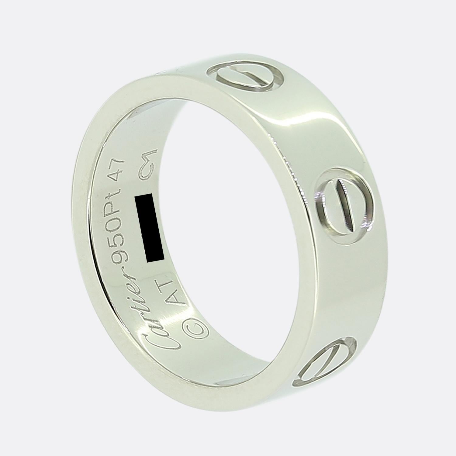 Here we have a platinum band ring from the world renowned luxury jewellery house of Cartier. The ring forms part of the iconic LOVE collection and is one of the most celebrated items of jewellery in the world. This is the wider model with a width