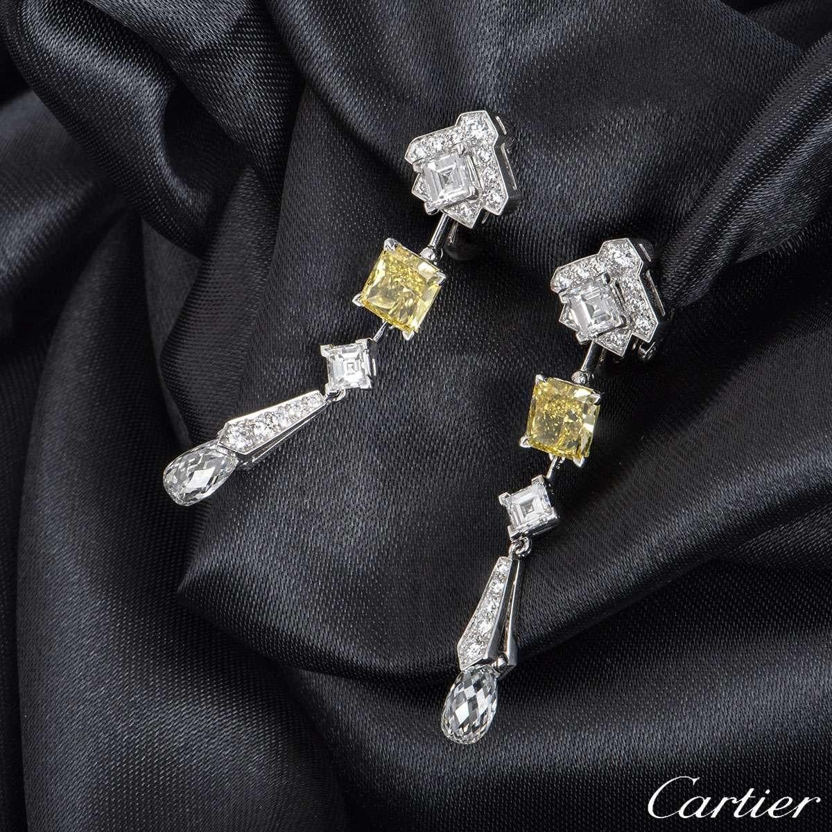 Emerald Cut Cartier Platinum Mousseline Fancy Vivid Yellow Radiant Cut Diamond Drop Earrings