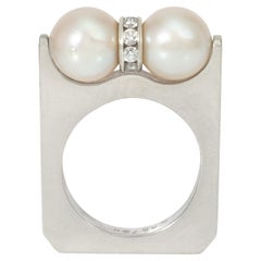 Bague tournante Cartier en platine, perles et diamants
