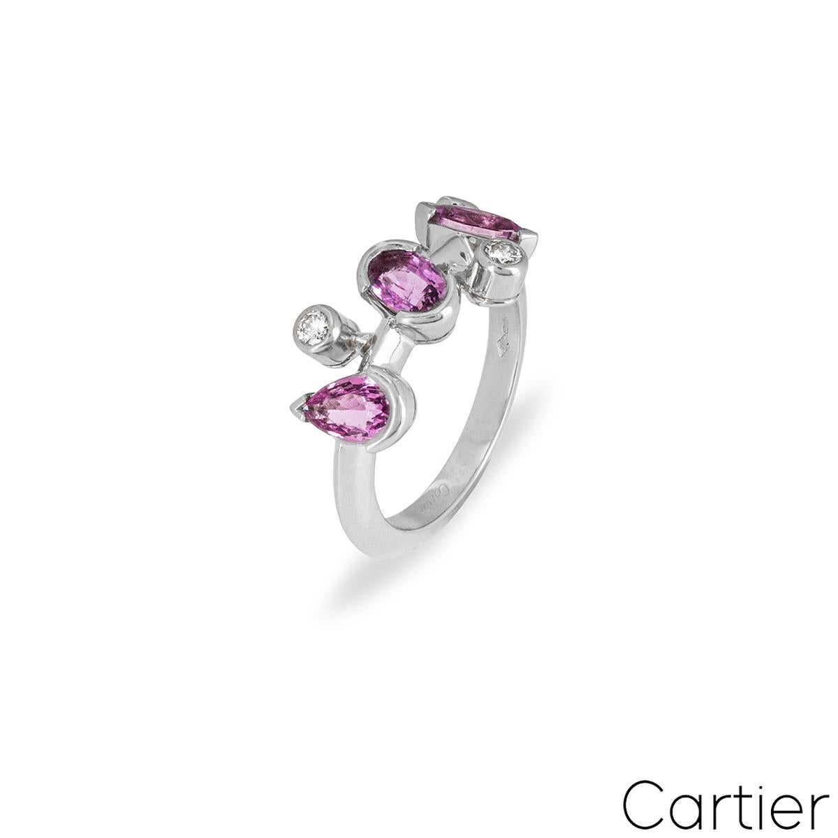 A pretty pink sapphire and diamond ring in platinum from the Cartier Meli Melo collection. The ring has a selection of marquise, oval and pear cut pink sapphires totalling approximately 1.30ct and 3 round brilliant cut diamonds totalling