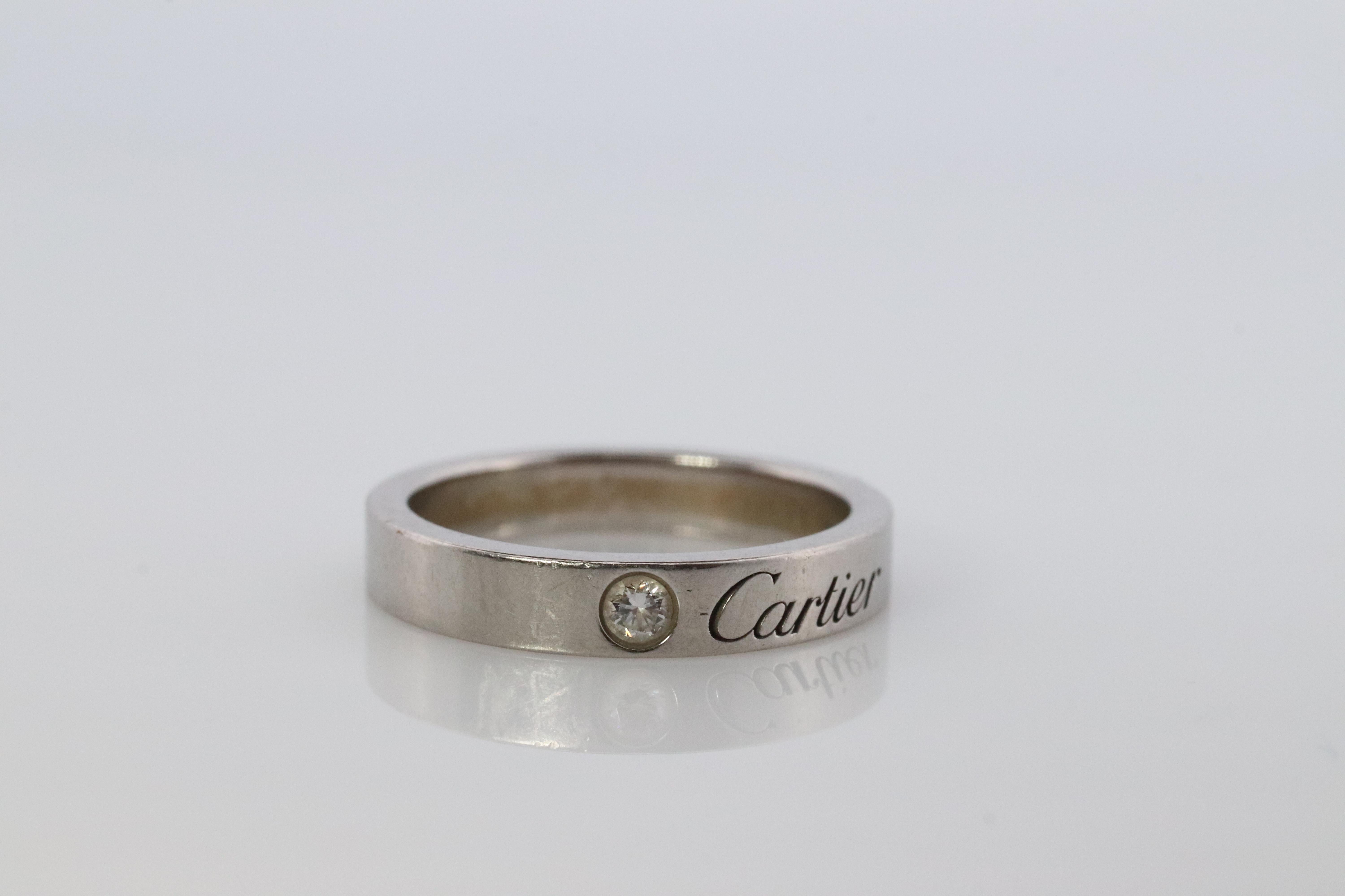 Modern CARTIER Platinum  Ring. Cartier Diamond Signature Bezel 3mm Band.