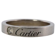 CARTIER Platinum Ring. Cartier Diamond Signature Bezel 3mm Band.