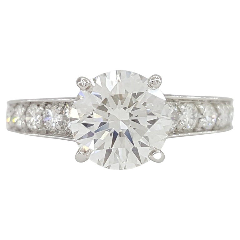 Bague de fiançailles en platine à diamant rond et taille brillante de  Cartier En vente sur 1stDibs