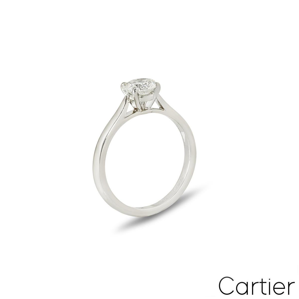 A lovely platinum diamond engagement ring by Cartier from the Solitaire 1895 collection. The ring comprises of a round brilliant cut diamond in a four prong setting weighing 0.68ct, G colour and VS1 clarity. The 2mm ring has a gross weight of 3.72