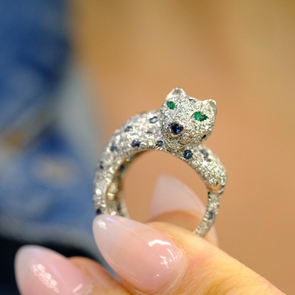 Contemporary Cartier Platinum Sapphire and Diamond Panther Pave Ring