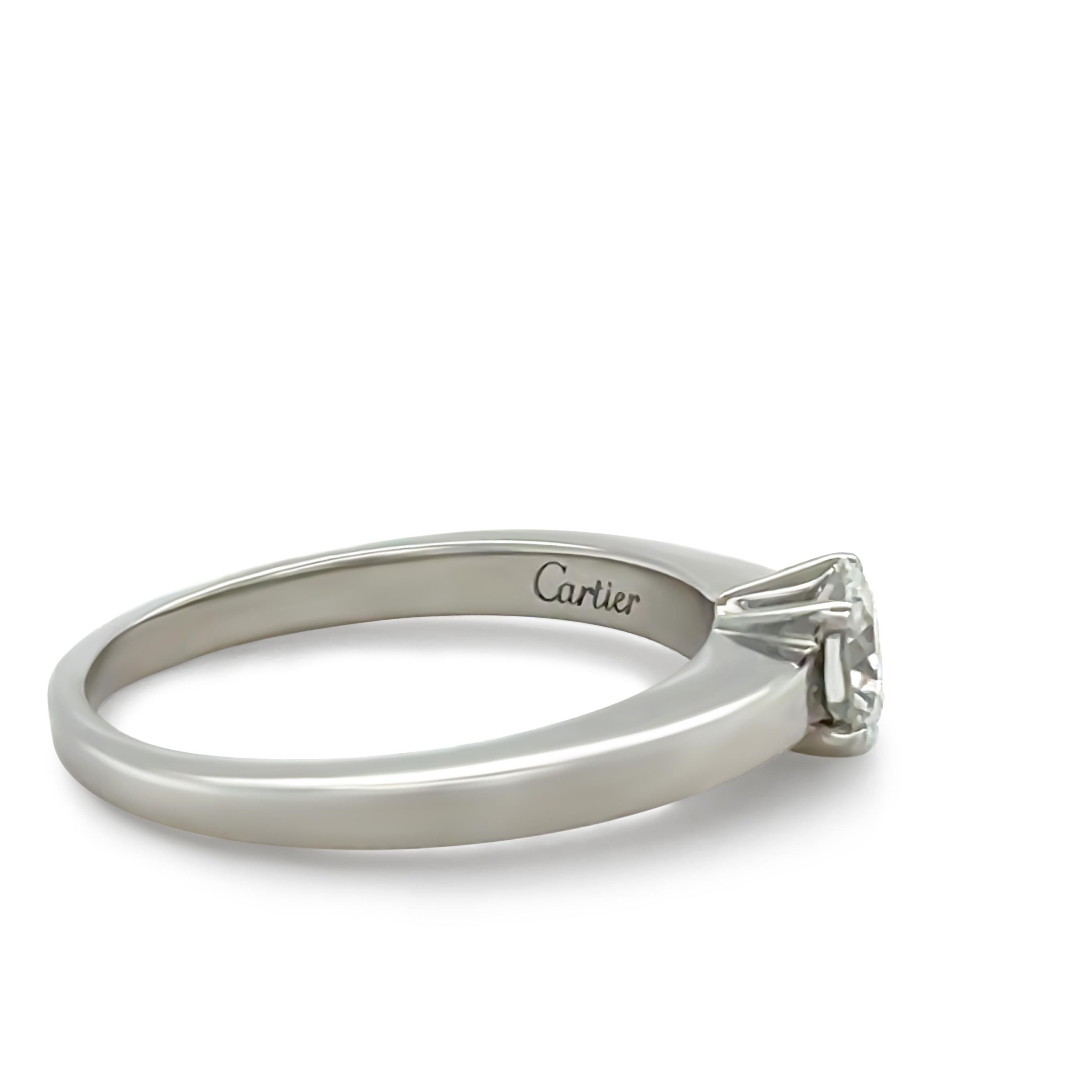 A Cartier Solitiare Diamond Ring, made of Platinum. Featuring a single Round Brilliant Cut Diamond claw set on a 2.5 to 1.6mm tapered band. G Colour, VVS1 Clarity with a total carat weight of 0.40ct. 

Metal: 950 Platinum
Carat: 0.40ct
Colour: