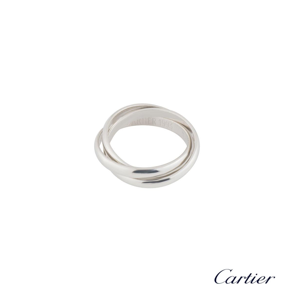 A lovely platinum Cartier ring from the Trinity de Cartier collection. The ring comprises of three interlocking 2mm bands. The ring is a size EU 52/UK M/US 6 and has a gross weight of 7.90 grams.

The ring comes complete with a presentation box and