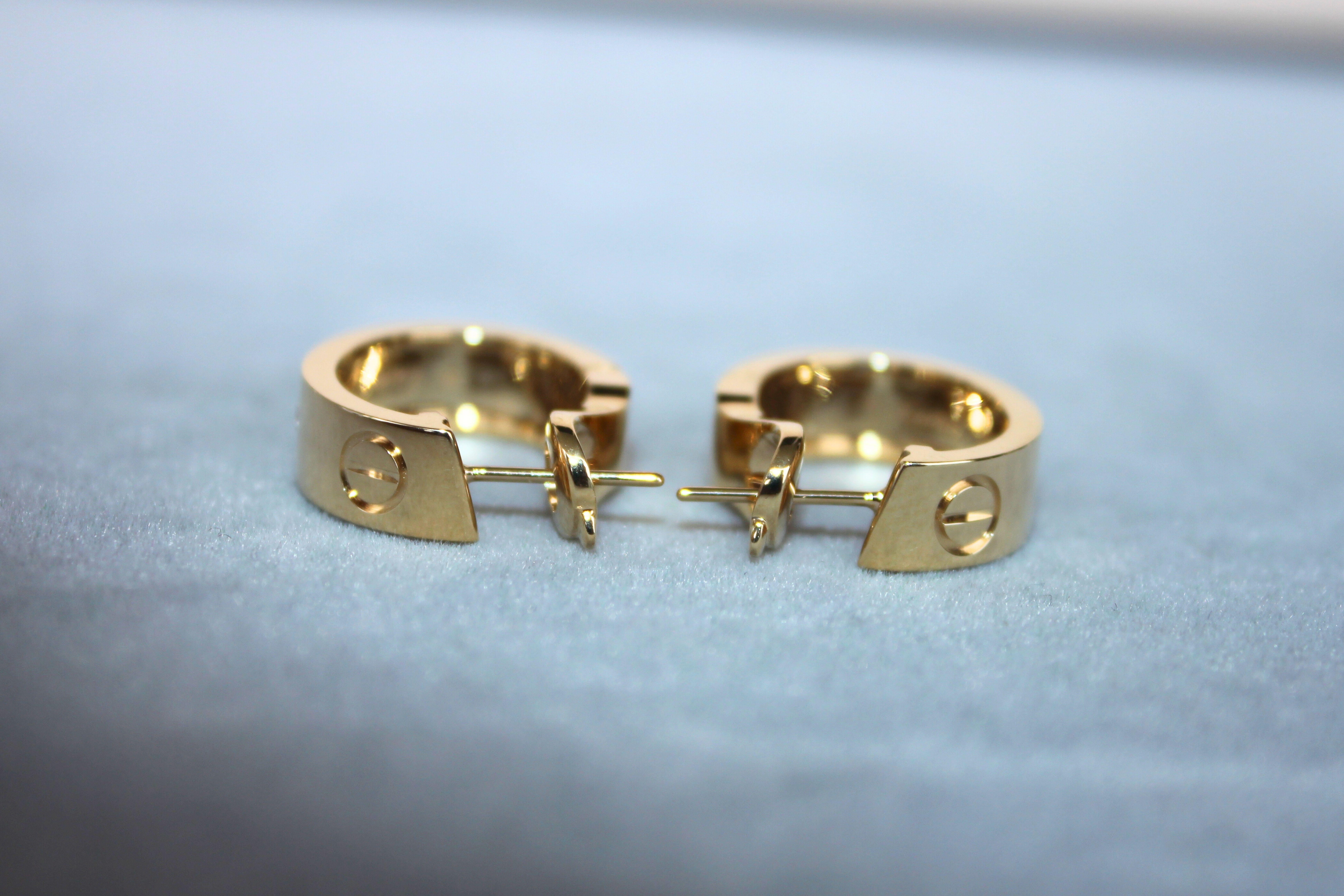 Women's or Men's Cartier Pre-Owned Love Diamond Bezel 18 Karat Yellow Gold Huggie Hoop Earrings For Sale