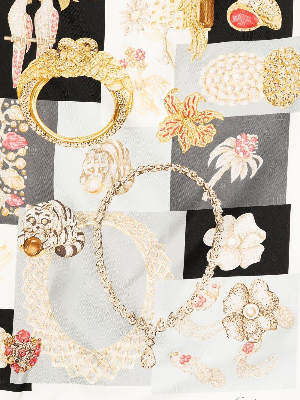 Cartier silk scarf adorned in various precious flora and fauna motives like bejewelled birds, wildcats, and more. Wear this accessory around your neck or handbag handles. Frame it on your wall for an alternative way to style it.