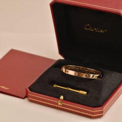 Bracelet d'amour en or rose 18K de Cartier, arc-en-ciel et multi-gemmes Taille 17