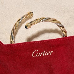 Rare bracelet Trinity de Cartier 3 ors serti de pointes de saphir cabochon