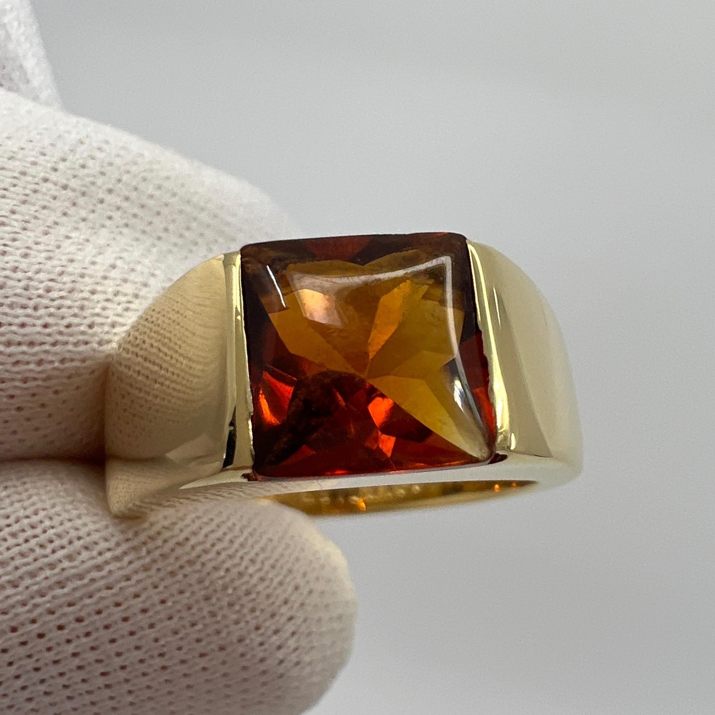 Vintage Cartier Deep Yellow Orange Citrine 18k Yellow Gold Tank Ring.

Stunning yellow gold ring with an 8mm tension set deep orange citrine. Fine jewellery houses like Cartier only use the finest of gemstones and this citrine is no exception. A top