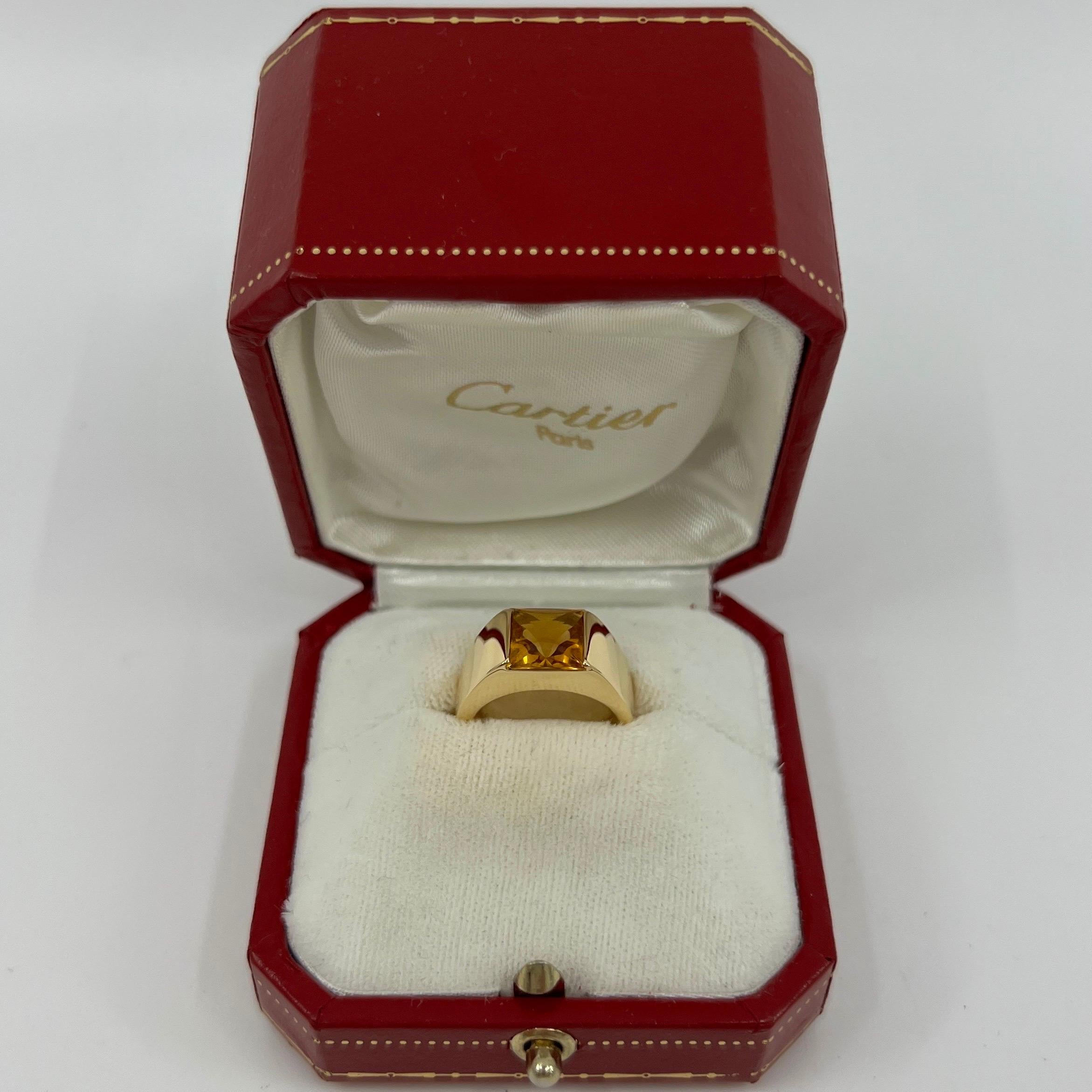 Vintage Cartier Yellow Orange Citrine 18k Yellow Gold Tank Ring.

Stunning yellow gold ring with an 8mm tension set vivid yellow orange citrine. Fine jewellery houses like Cartier only use the finest of gemstones and this citrine is no exception. A