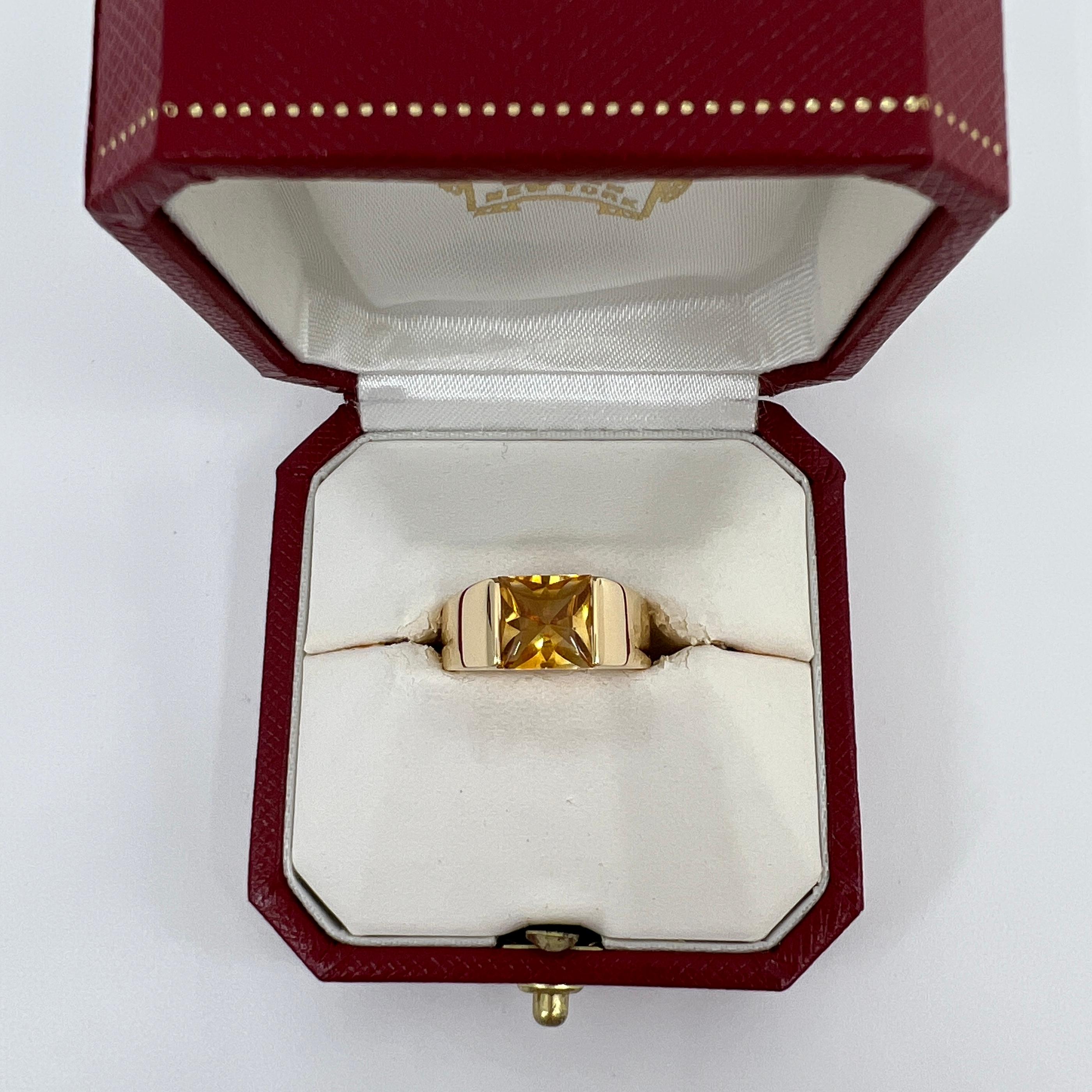 Cartier Vivid Yellow Citrine 18k Yellow Gold Tank Ring.

Stunning yellow gold ring with an 8mm tension set vivid yellow citrine. Fine jewellery houses like Cartier only use the finest of gemstones and this citrine is no exception. A top grade