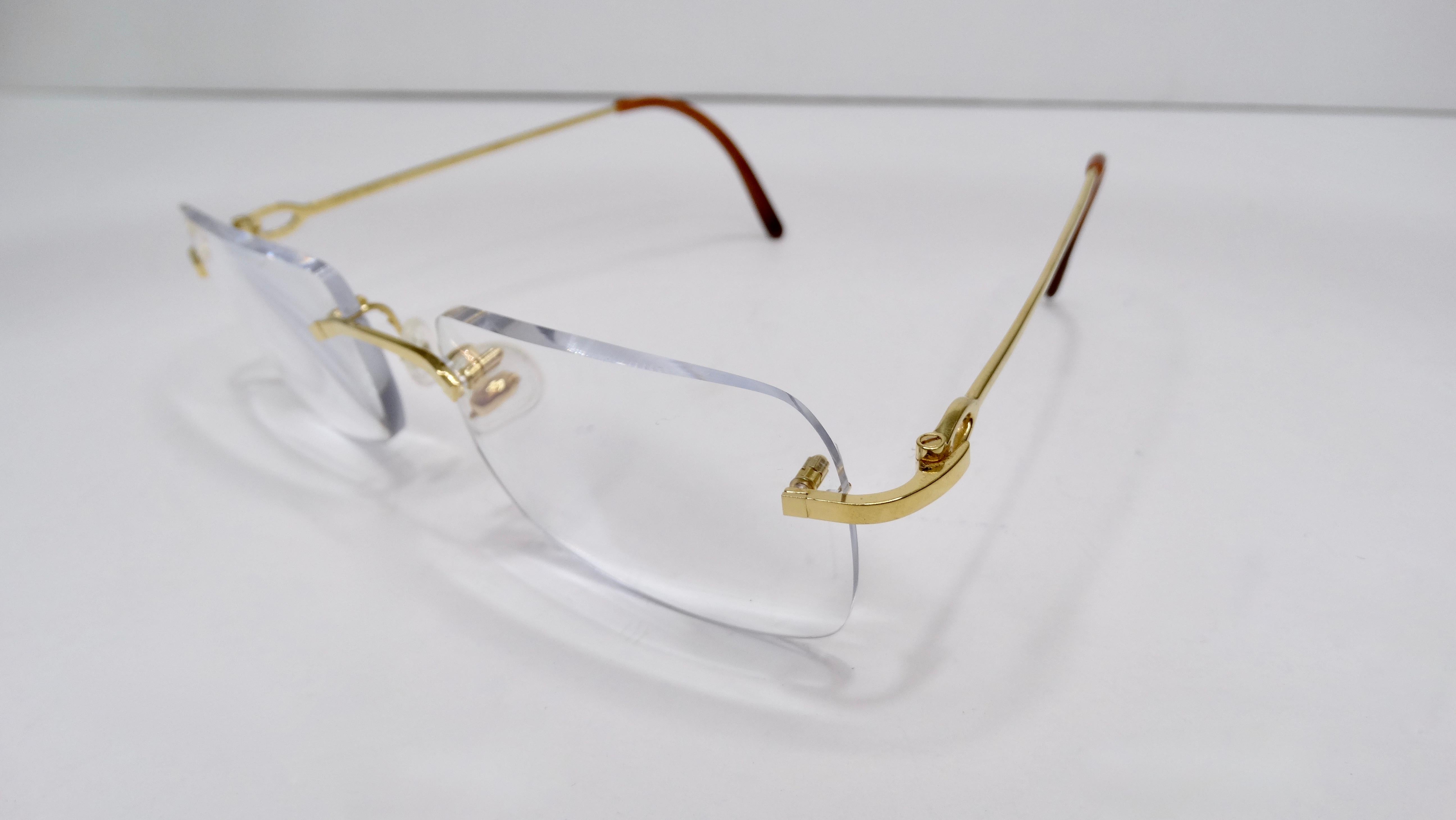 A favorite of both jewelry and fashion lovers, Cartier is always a classic! Circa 1980s, these rimless glasses feature an 18k gold plated frame with a subtle design at the arms. Cartier stamping throughout. The lenses in these glasses are