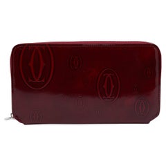 Portefeuille zippé en cuir rouge brillant Happy Birthday de Cartier