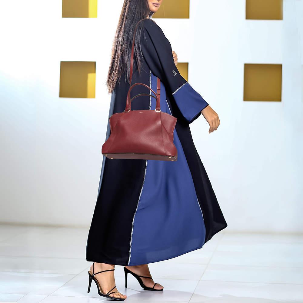 Functional and stylish, this designer label's collections capture the effortless, elegant finesse of the modern woman. Crafted from quality materials, this chic bag is easy to carry and can fit in your daily essentials effortlessly.


