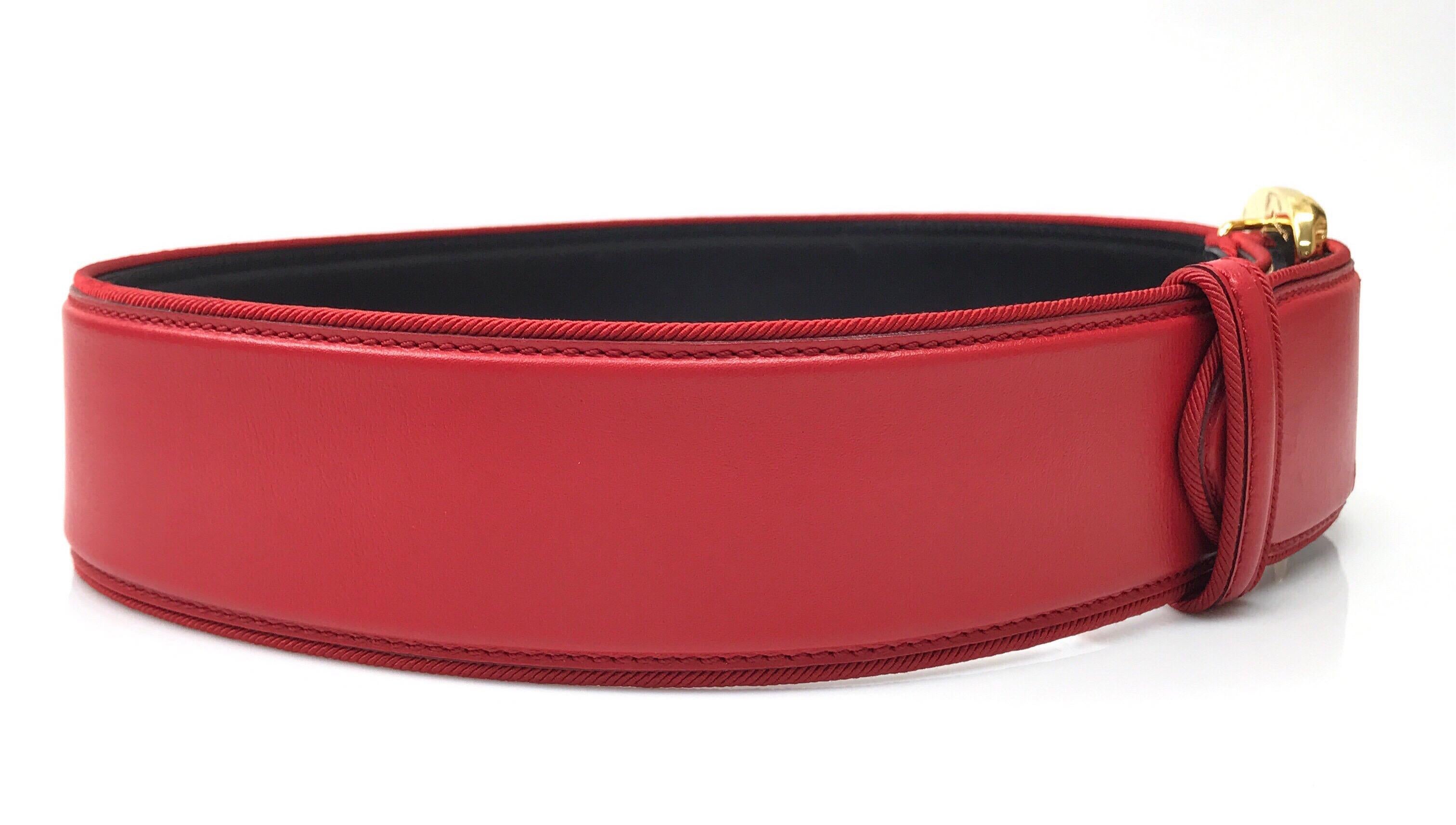 CARTIER Red Thick Belt w/ Gold Jaguar Clasp. This stunning Cartier belt is in excellent condition. There is barely any sign of use, with exception to a thin crack in the leather near the first hole. The belt is made of a bold red leather on the