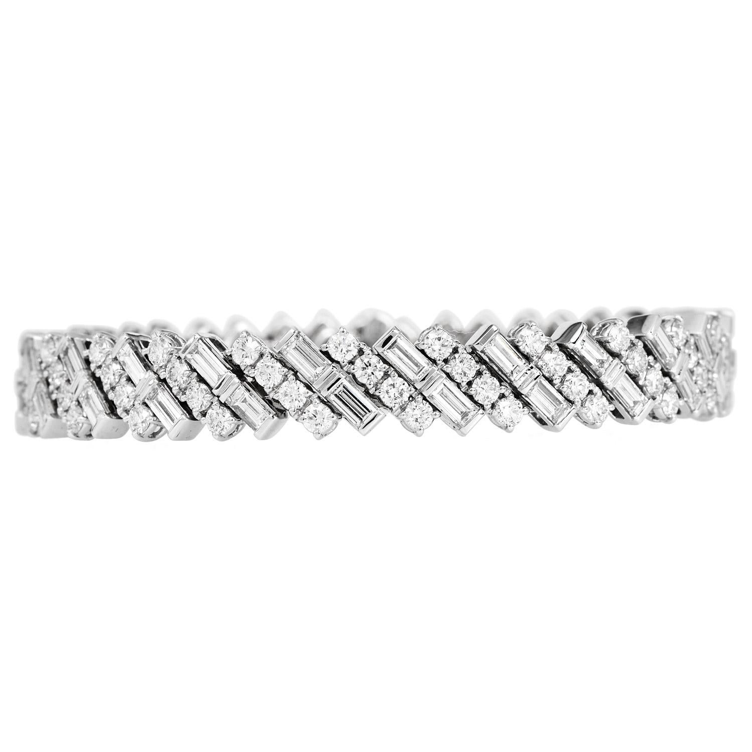 Reflection de Cartier Diamond High Jewelry Bracelet crafted in 18K white gold, features a dazzling composition of 92 brilliant-cut diamonds, and 46 baguette-cut diamonds totaling a combined weight of approx. 8.92 carats of E-F color, VVS clarity