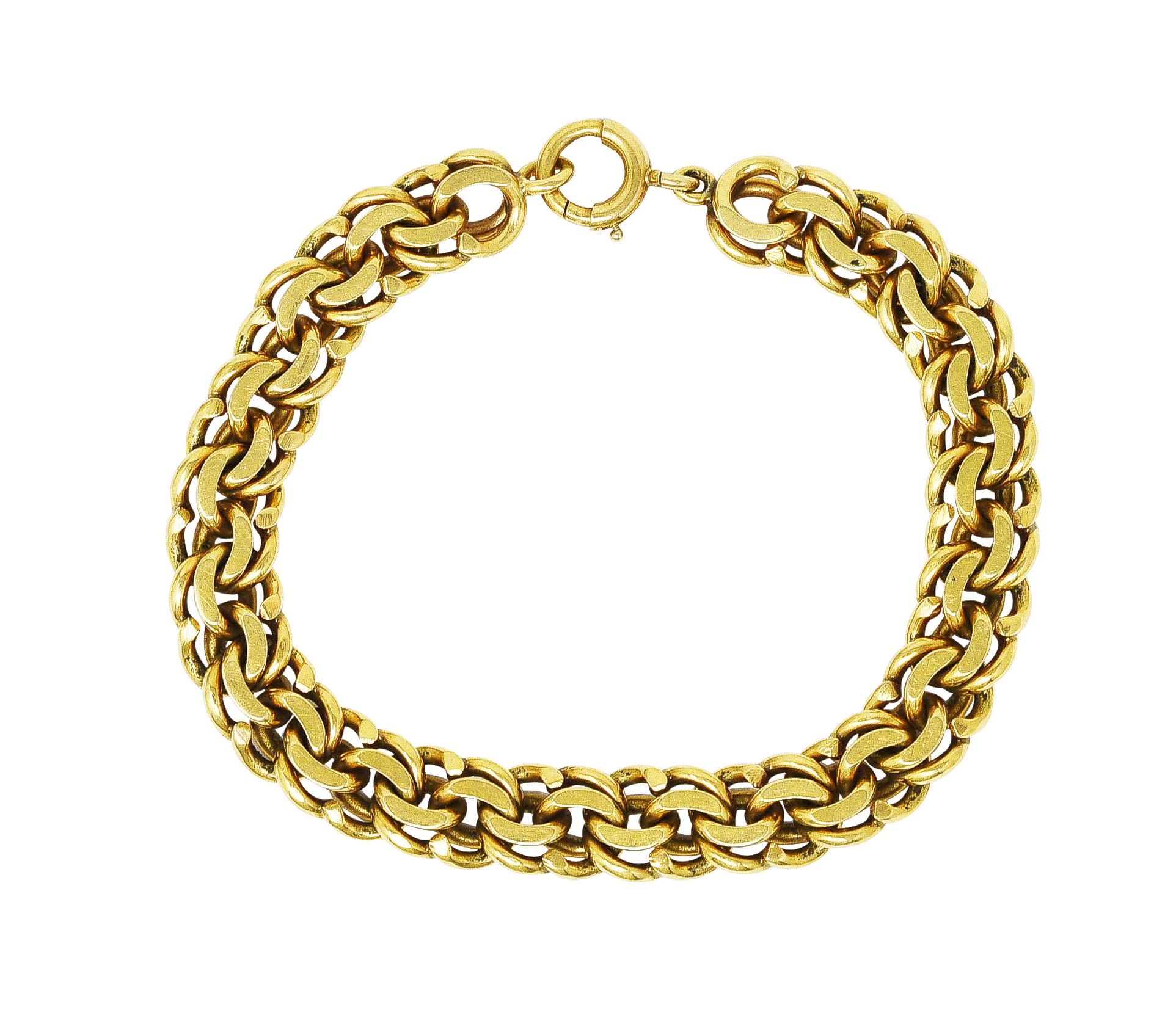 Designed as a doubled curb link chain. With high polished finish. Completed by spring clasp closure. Tested as 14 karat gold. Numbered and fully signed Cartier. Circa: 1940's. Bracelet size: 7 1/2 inch circumference with 3 inch diameter. Total