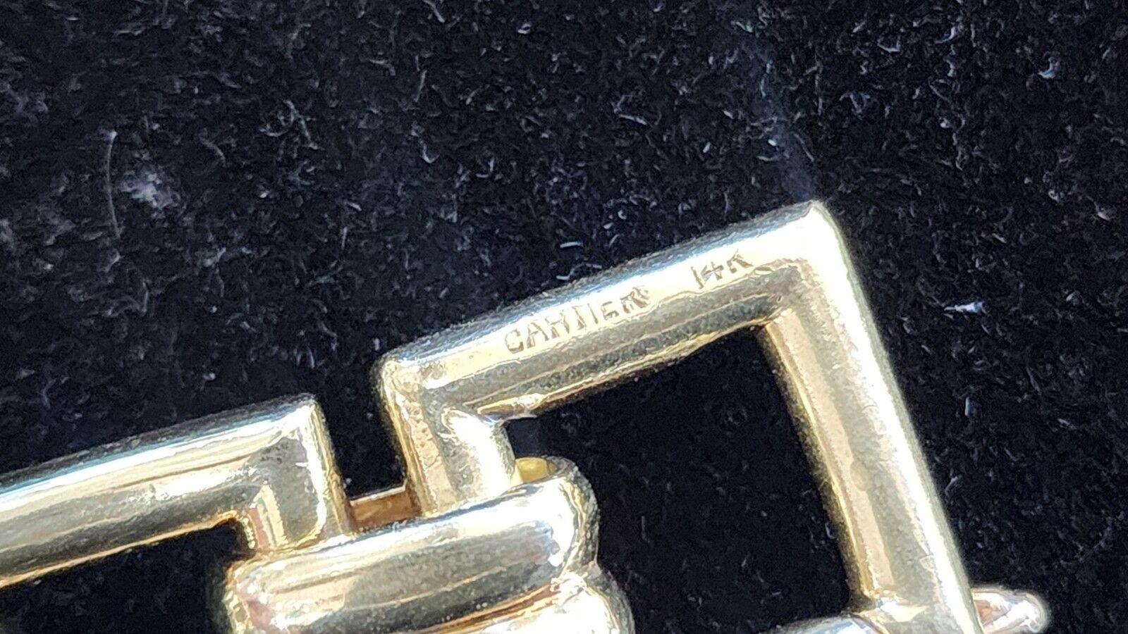 Cartier Retro 14k Yellow Gold Link Bracelet w/Box Circa 1940s

Voici l'occasion d'acquérir un magnifique bracelet de créateur très recherché. C'est vraiment une belle pièce à un bon prix ! 

Détails :

Le bracelet est un Cartier rétro des années