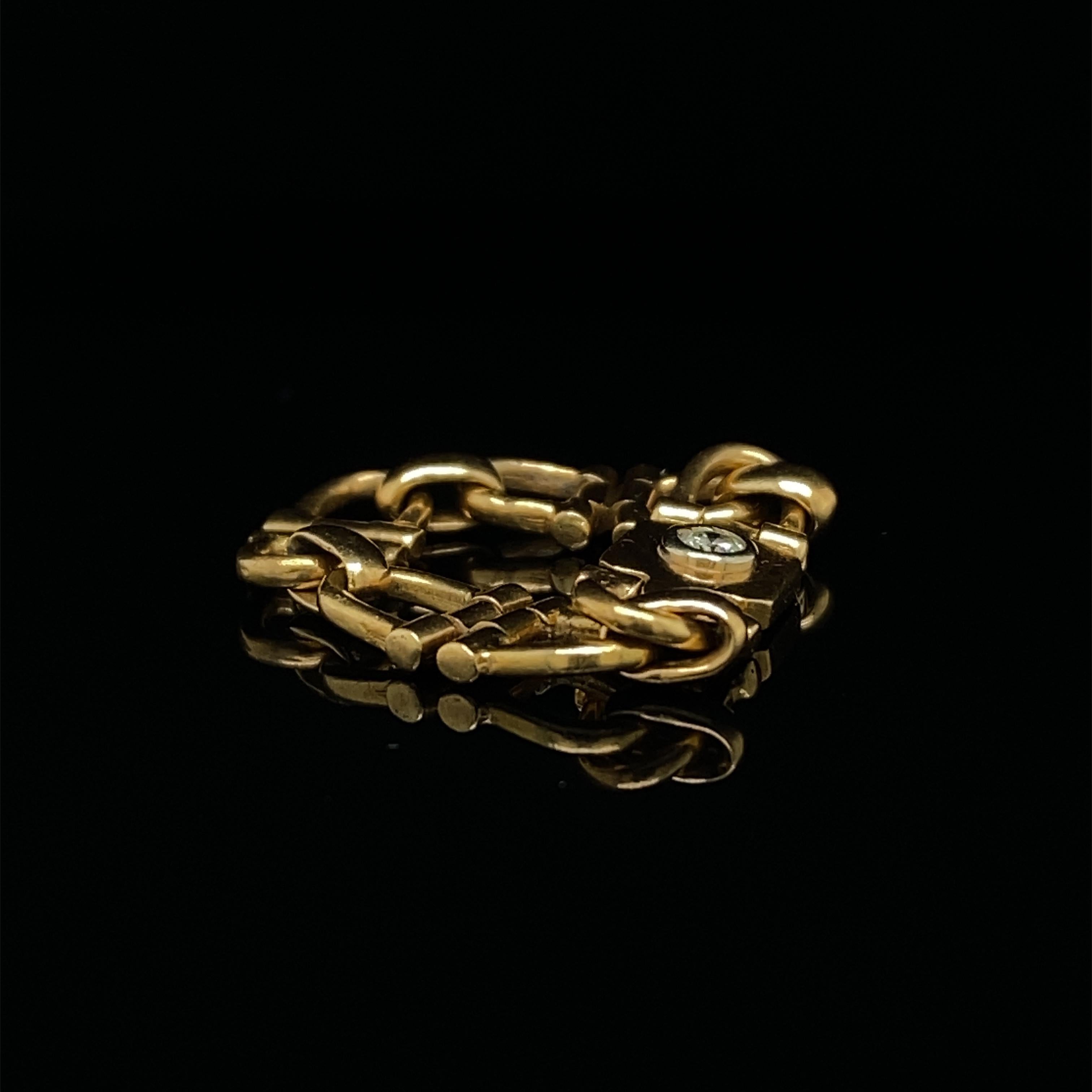 Cartier Retro Flexible Diamond 18 Karat Yellow Gold Ring, Circa 1980. 1