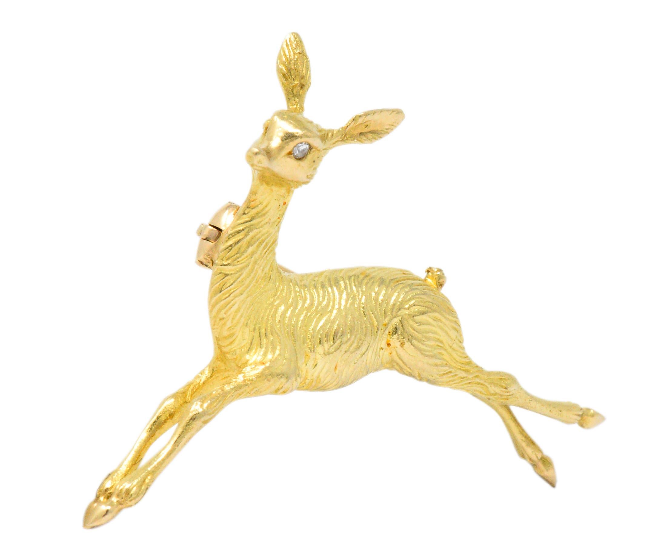 Designed as a leaping doe with a single cut diamond eye, weighing approximately 0.01 carat total, eye-clean and white

Wonderfully detailed, you can make out the fur, hooves and tail

Fully signed Cartier, 
