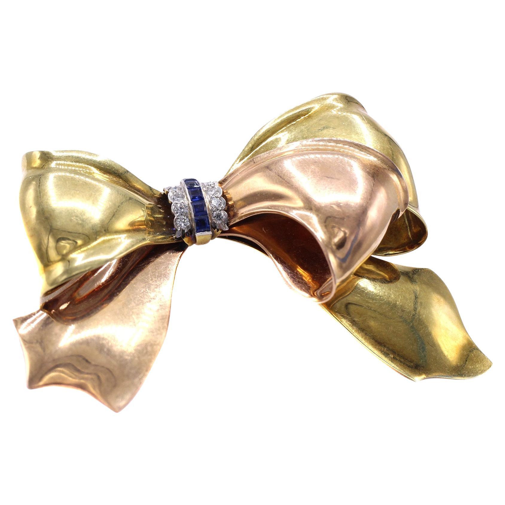 Cartier Retro Sapphire Diamond Two Color Gold Bow Brooch For Sale