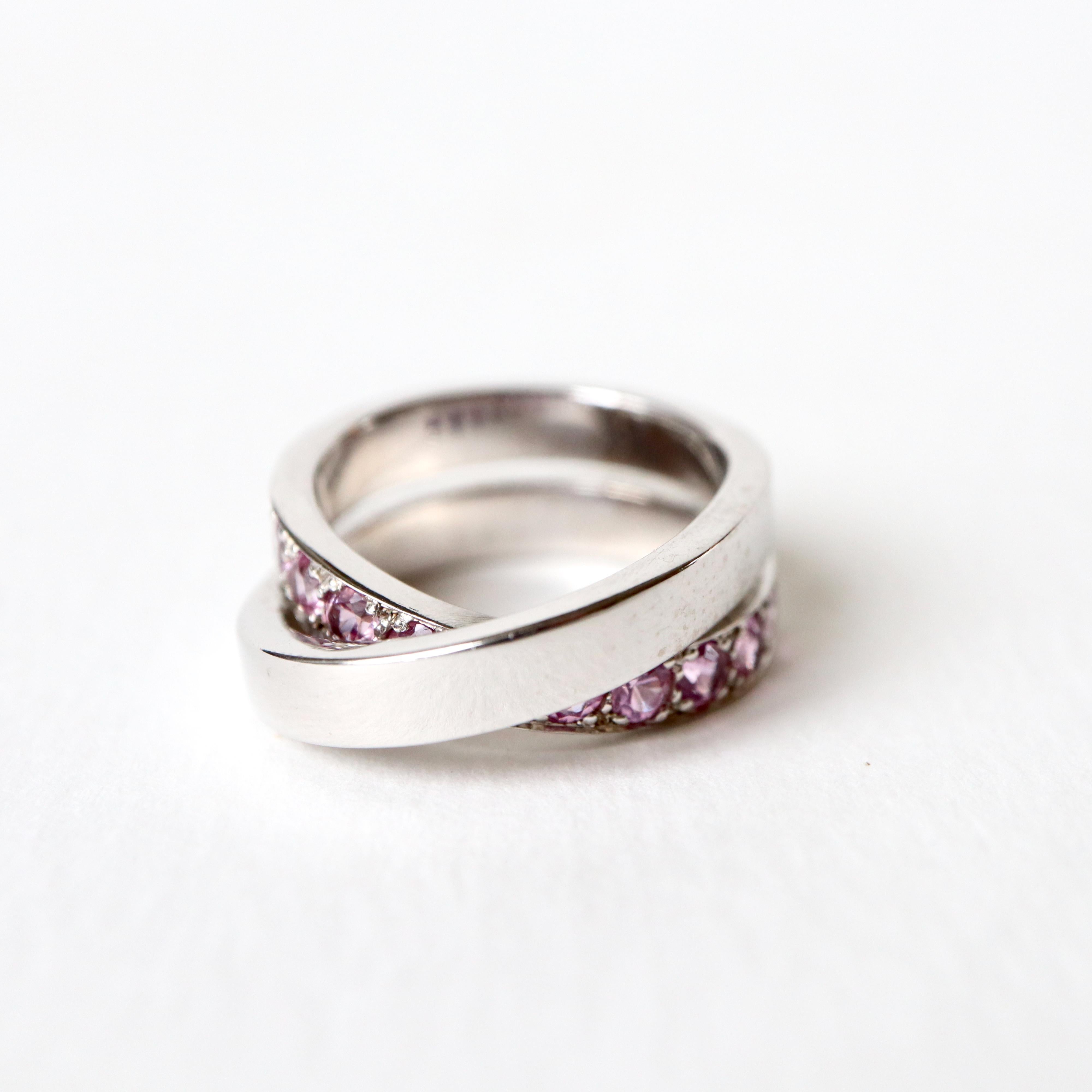 CARTIER Ring in 18-carat white gold, double ring set with pink Sapphires on part of the ring 
Signed CARTIER marked 750 54 and numbered
Size 54, US Size 6.75
Gross weight 13.6 g
Some spots on gold (see the pictures)