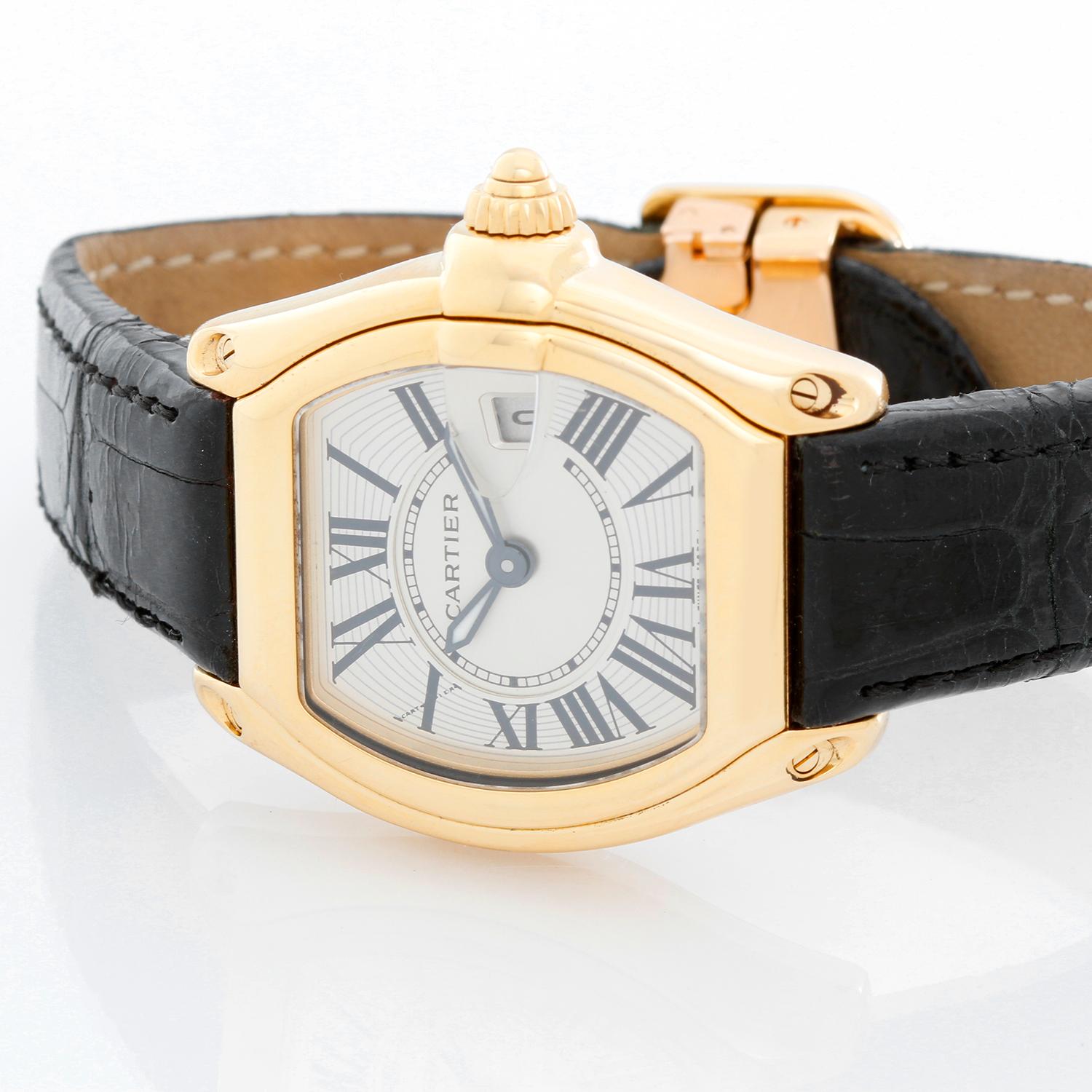 Cartier Roadster 18k Yellow Gold Ladies 31mm Quartz Watch W62018Y5 - Quartz. 18k yellow gold case (31mm x 36mm). Silver guilloche dial with black Roman numerals; date at 3 o'clock.  Strap band with 18k yellow gold Cartier deployant clasp. Pre-owned