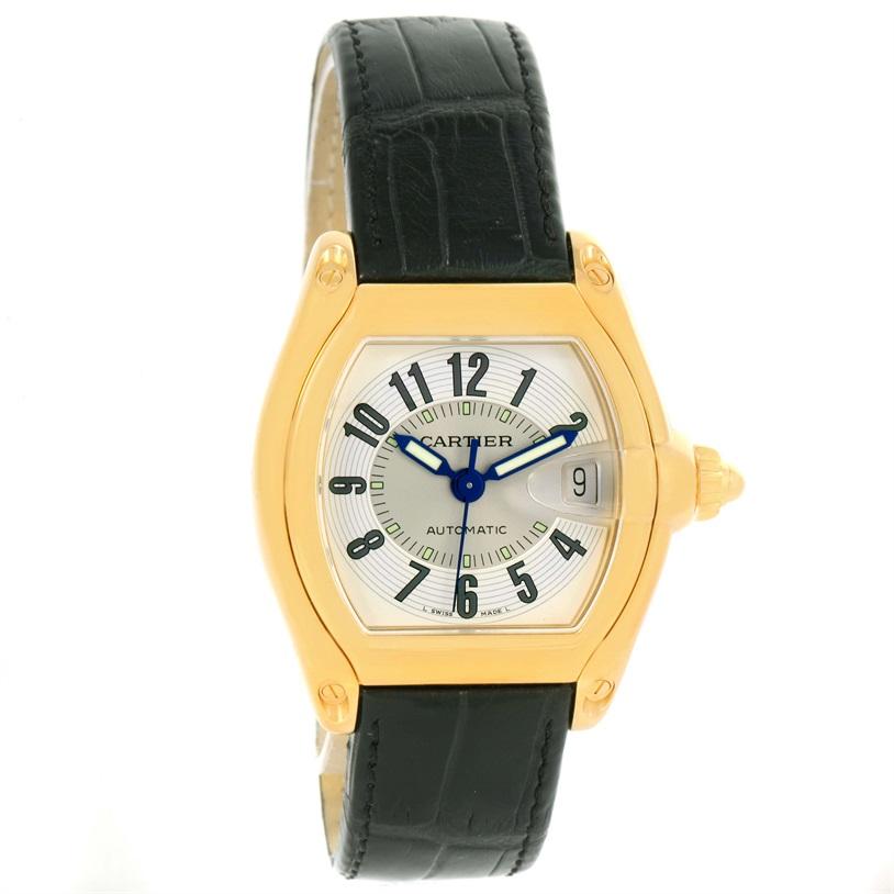 Cartier Roadster 18K Yellow Gold Silver Dial Large Watch W62005V2. Automatic self-winding movement. 18K yellow gold tonneau shaped case 37 x 44 mm. Scratch resistant sapphire crystal with cyclops magnifying glass. Silver dial with black arabic